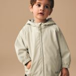 Kaufen Sie Buttermilch Wasserfeste Regenjacke (3Monate bis7Jahre) bei Next Deutschland